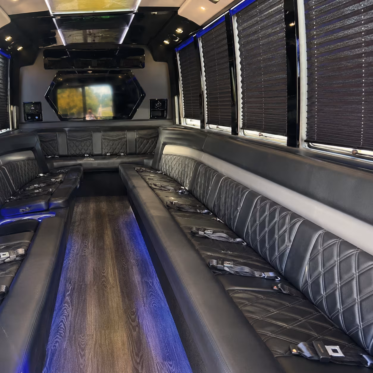 Wedding guests seated inside a party bus serving Round Rock